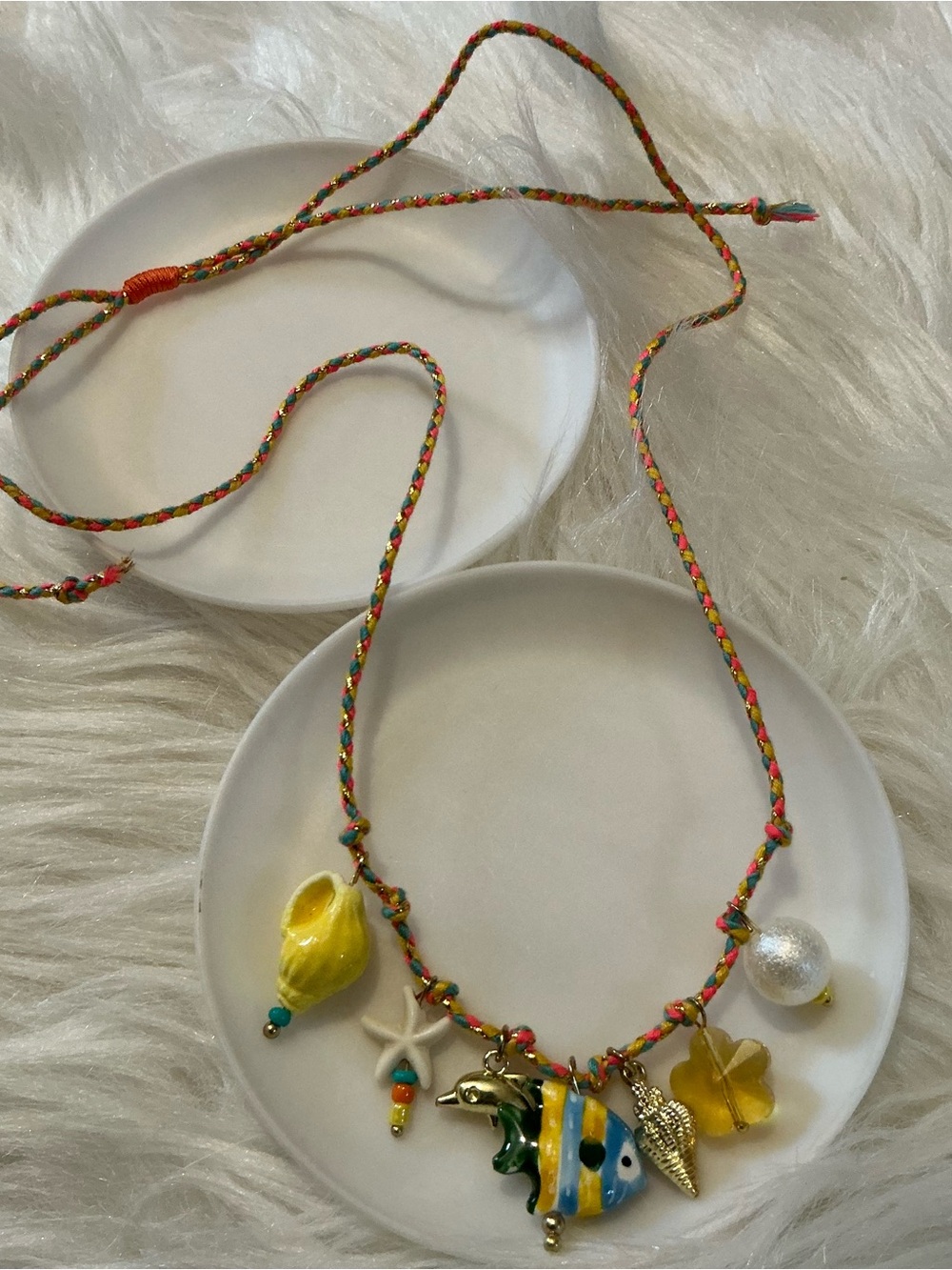 Colorful yellow/orange ocean/beach shell, seastar, dolphin, fish string necklace